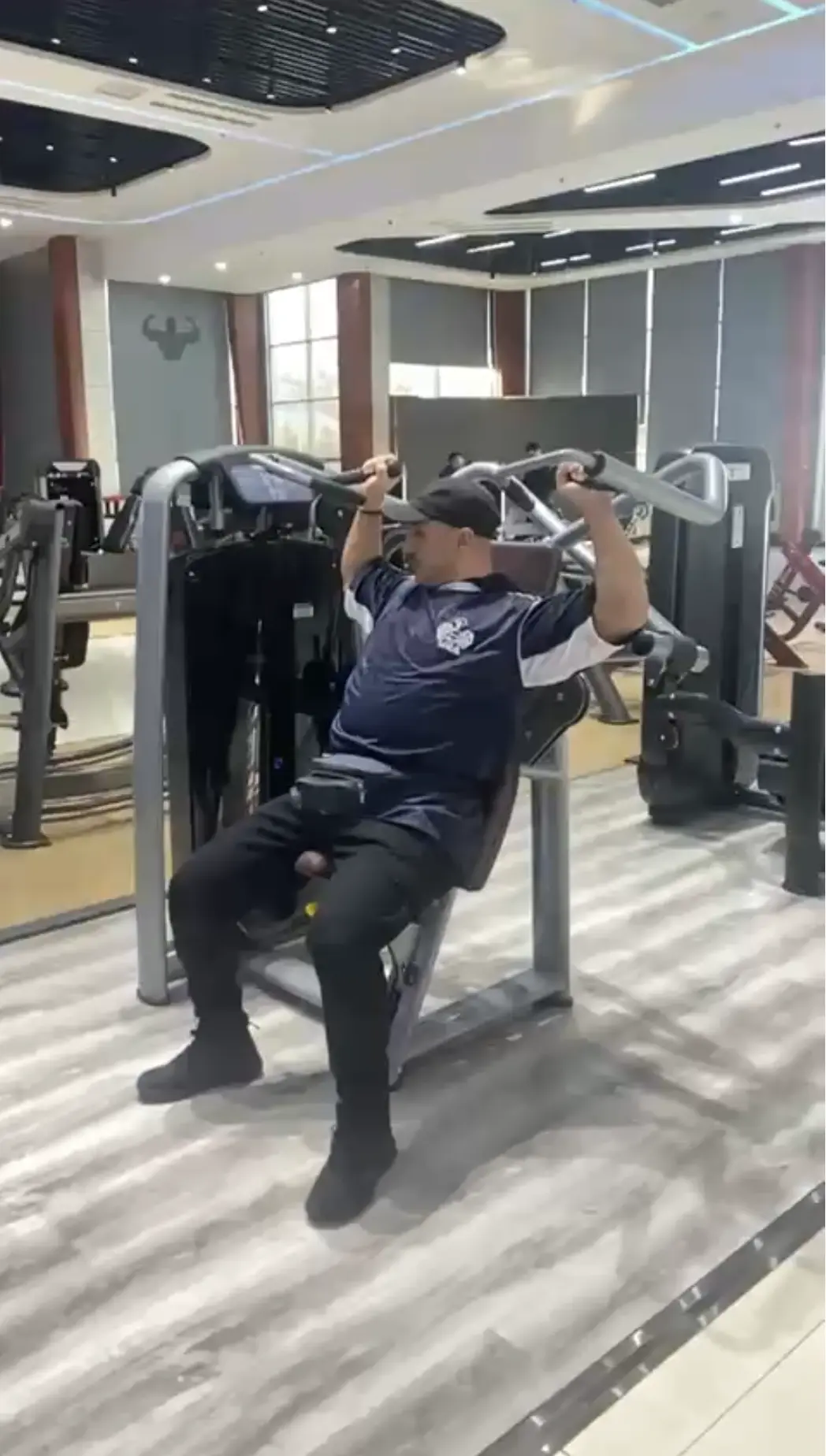 Moe inspecting gym machines
